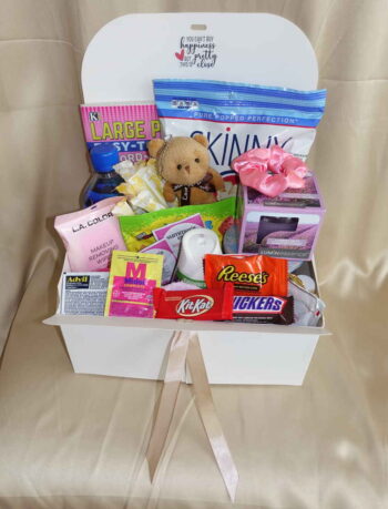 Period care package with feminine essential tampons, spa worthy products, and sweet delectables.