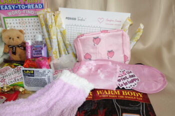 Period starter kit products displayed with feminine hygiene items and indulgent healthy snacks.